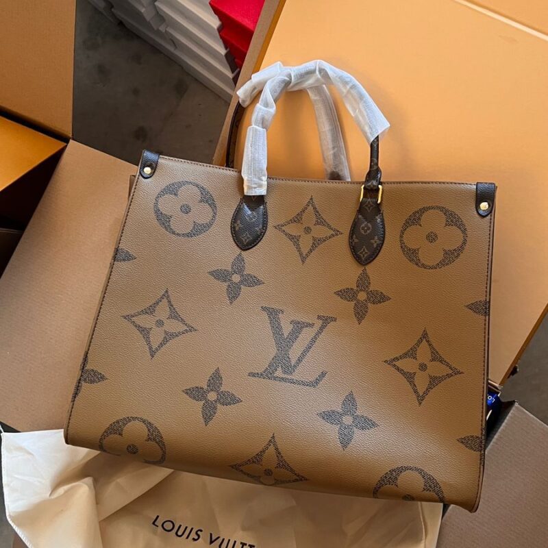 Louis Vuitton OnTheGo MM Empreinte Leather Tote Bag