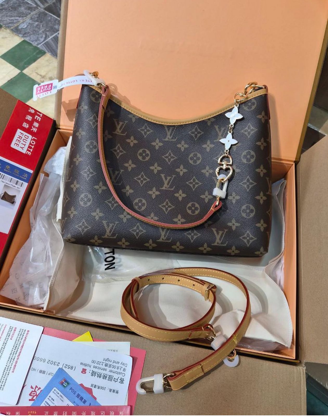 Louis Vuitton CarryAll Hobo Bag for Women