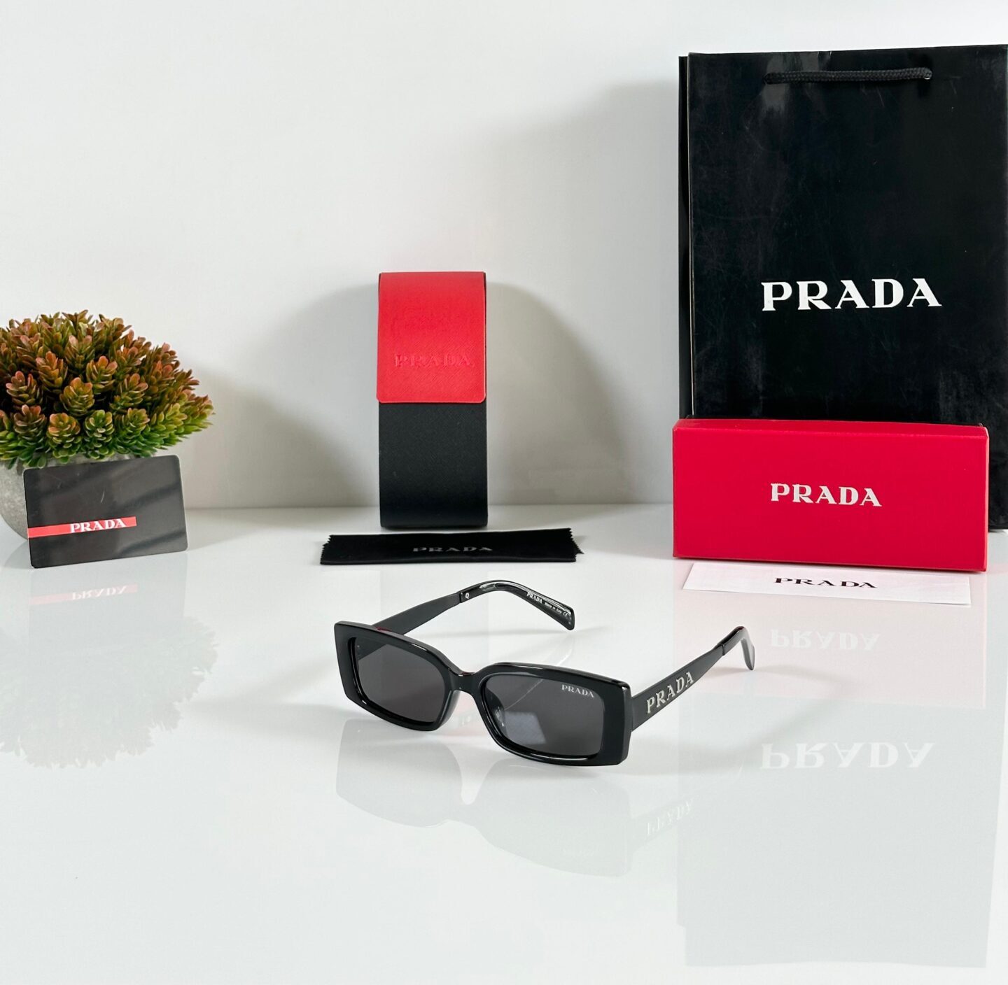 Prada rectangular Unisex Sunglasses